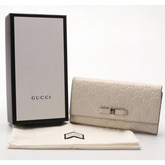 Gucci Handbags - GUCCI Guccisima White Calfskin
Leather Bow Wallet Full Inclusion